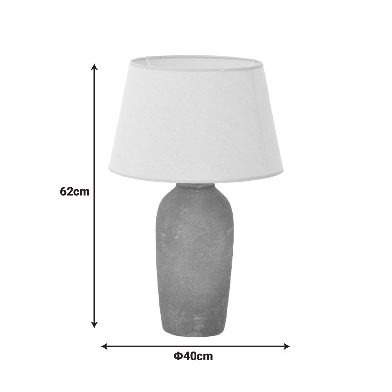 Модерна уметничка столна светилка Table Lamp Waveic со релјефна керамичка основа во беж нијанса и елегантен текстилен абажур што шири топла амбиентална светлина